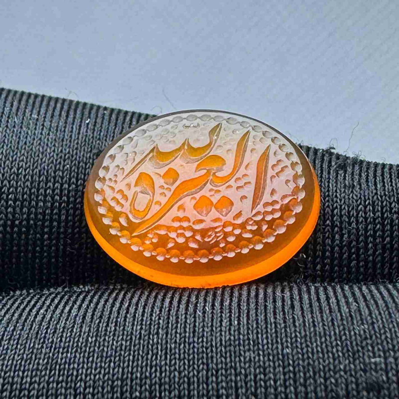 حجر عقيق احمر منقوش