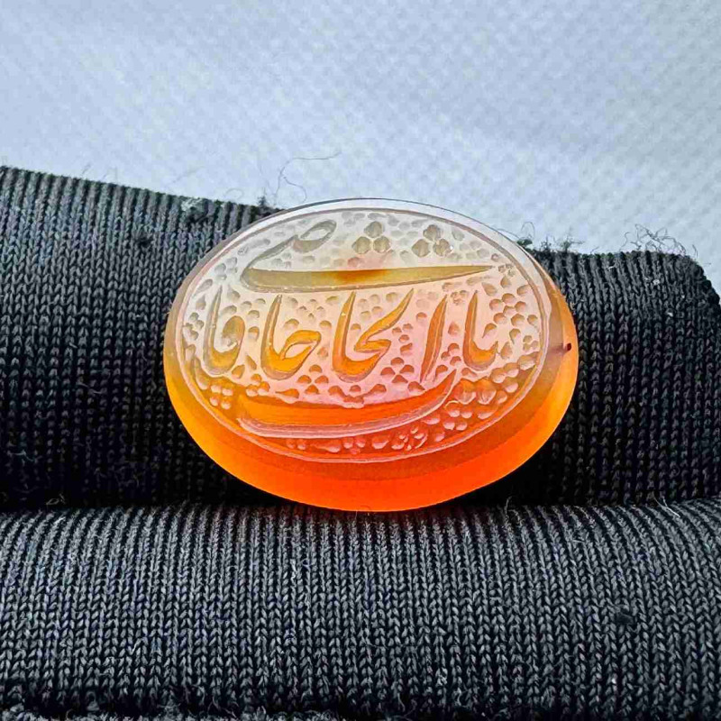 حجر عقيق احمر منقوش