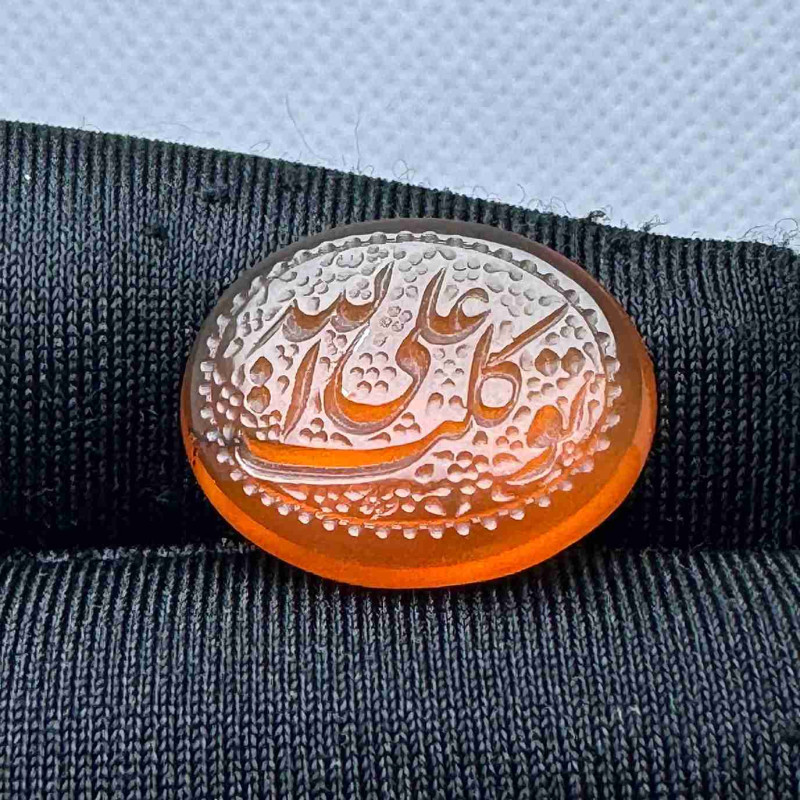 حجر عقيق احمر منقوش